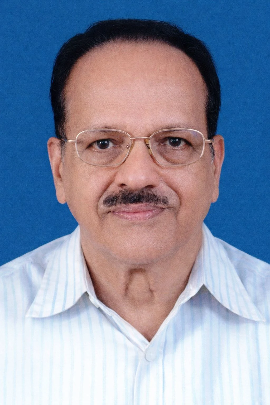 Dr. K J Devasia